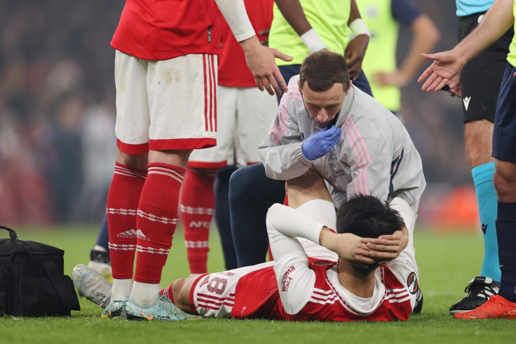 LONDON, ENGLAND - NOVEMBER 03: Takehiro Tomiyasu of Arsenal is seen injured before being substituted off during the UEFA Europa League group A match between Arsenal FC and FC Zürich at Emirates Stadium on November 03, 2022 in London, England. (Photo by Ryan Pierse/Getty Images)