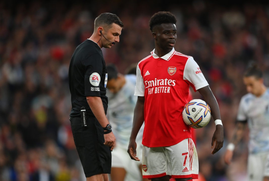 LONDON, ENGLAND - OCTOBER 09: Bukayo Saka of Arsenal looks on before taking a penalty during the Premier League match between Arsenal FC and Liverpool FC at Emirates Stadium on October 09, 2022 in London, England. (Photo by Shaun Botterill/Getty Images)