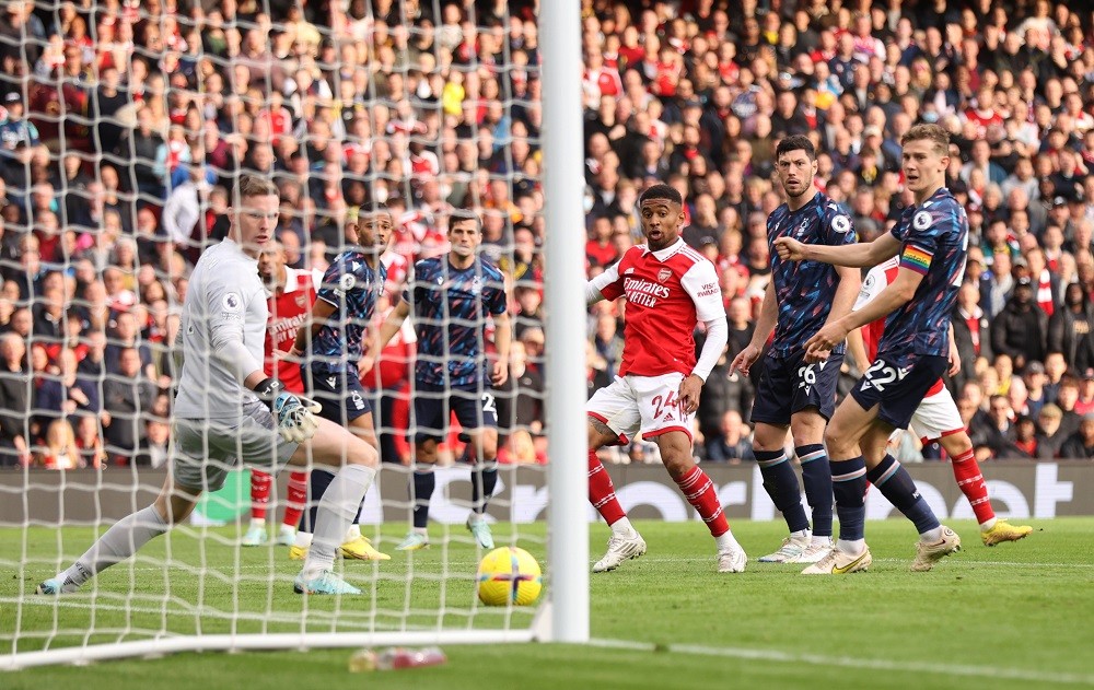 LONDON, ENGLAND: Reiss Nelson of Arsenal scores his side's third goal during the Premier League match between Arsenal FC and Nottingham Forest at Emirates Stadium on October 30, 2022. (Photo by Alex Pantling/Getty Images)