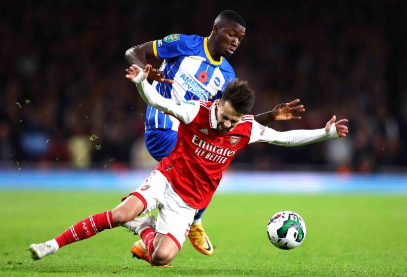 LONDON, ENGLAND - NOVEMBER 09: Fabio Vieira of Arsenal is tackled by Moises Caicedo of Brighton & Hove Albion during the Carabao Cup Third Round match between Arsenal and Brighton & Hove Albion at Emirates Stadium on November 09, 2022 in London, England. (Photo by Clive Rose/Getty Images)