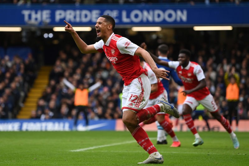 LONDON, ENGLAND - NOVEMBER 06: William Saliba celebrates after Gabriel of Arsenal (not pictured) scored their sides first goal during the Premier League match between Chelsea FC and Arsenal FC at Stamford Bridge on November 06, 2022 in London, England. (Photo by Justin Setterfield/Getty Images)