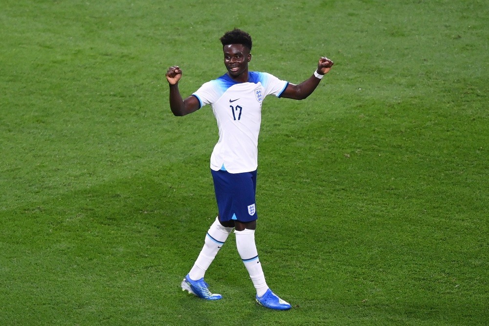DOHA, QATAR: Bukayo Saka of England celebrates after scoring his team's fourth goal during the FIFA World Cup Qatar 2022 Group B match between England and IR Iran at Khalifa International Stadium on November 21, 202. (Photo by Laurence Griffiths/Getty Images)