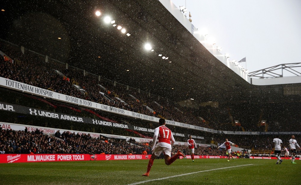 Arsenal's Chilean striker Alexis Sanchez (C) celebrates after scoring their second goal during the English Premier League football match between Tottenham Hotspur and Arsenal at White Hart Lane in London, on March 5, 2016. (Photo: ADRIAN DENNIS/AFP via Getty Images)