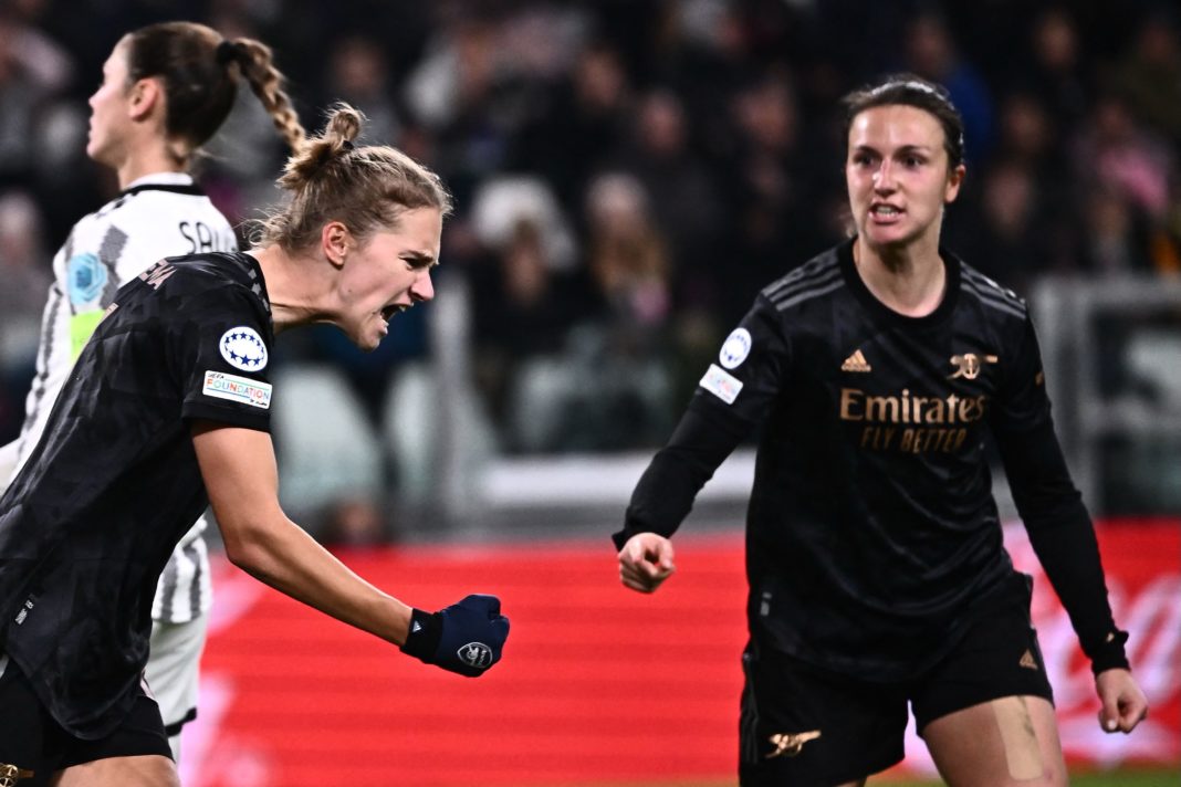 Arsenals Dutch forward Vivianne Miedema (L) celebrates with Arsenals English defender Lotte Wubben-Moy after scoring a goal during the UEFA Women's Champions League Group C football match between Juventus and Arsenal at the Juventus stadium in Turin on November 24, 2022. (Photo by MARCO BERTORELLO/AFP via Getty Images)