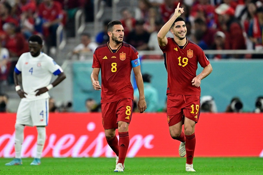 Spain's midfielder Carlos Soler celebrates after scoring his team's sixth goal during the Qatar 2022 World Cup Group E football match between Spain and Costa Rica at the Al-Thumama Stadium in Doha on November 23, 2022. (Photo by JAVIER SORIANO/AFP via Getty Images)