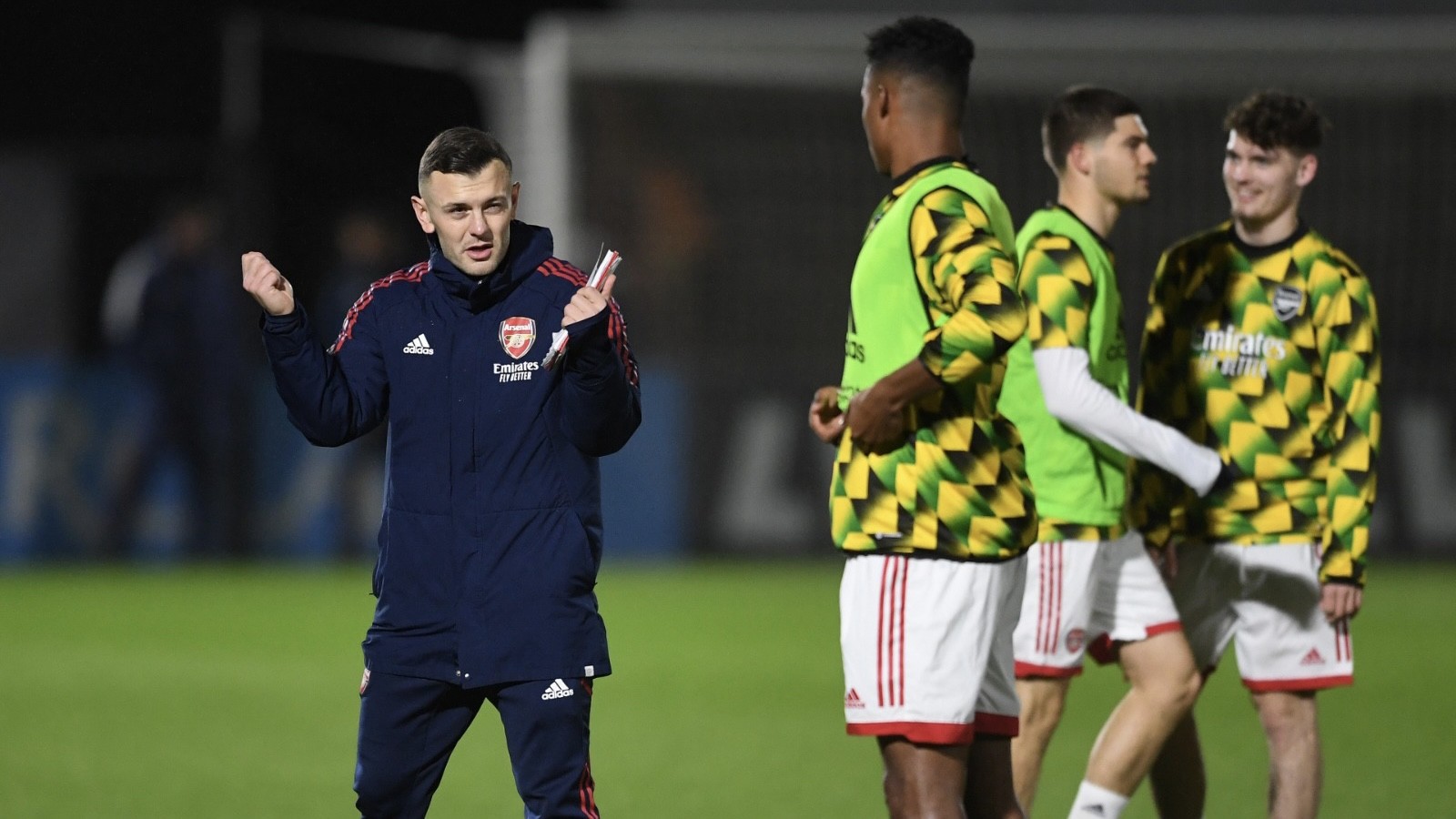 Jack Wilshere talks to Reuell Walters with the Arsenal academy (Photo via Arsenal Academy on Twitter)