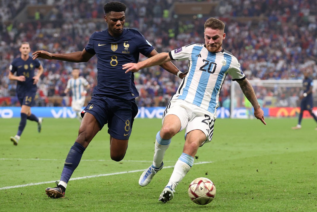 LUSAIL CITY, QATAR: Aurelien Tchouameni of France battles with Alexis Mac Allister of Argentina during the FIFA World Cup Qatar 2022 Final match between Argentina and France at Lusail Stadium on December 18, 2022. (Photo by Julian Finney/Getty Images)