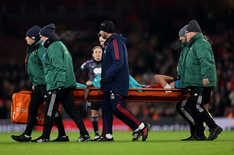 LONDON, ENGLAND - DECEMBER 15: Vivianne Miedema of Arsenal is stretchered off after picking up a serious leg injury during the UEFA Women's Champions League group C match between Arsenal and Olympique Lyon at Emirates Stadium on December 15, 2022 in London, England. (Photo by Ryan Pierse/Getty Images)