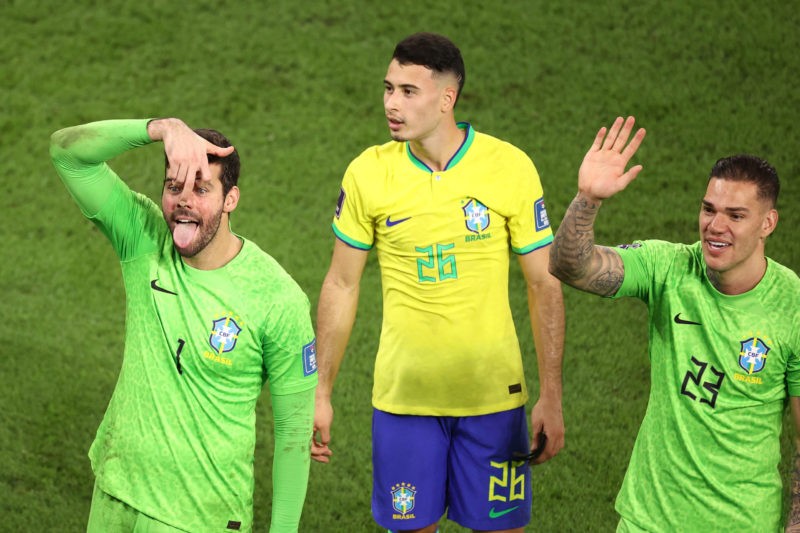 DOHA, QATAR - DECEMBER 05: Alisson Becker, Gabriel Martinelli and Ederson of Brazil applaud fans after the 4-1 win during the FIFA World Cup Qatar 2022 Round of 16 match between Brazil and South Korea at Stadium 974 on December 05, 2022 in Doha, Qatar. (Photo by Robert Cianflone/Getty Images)