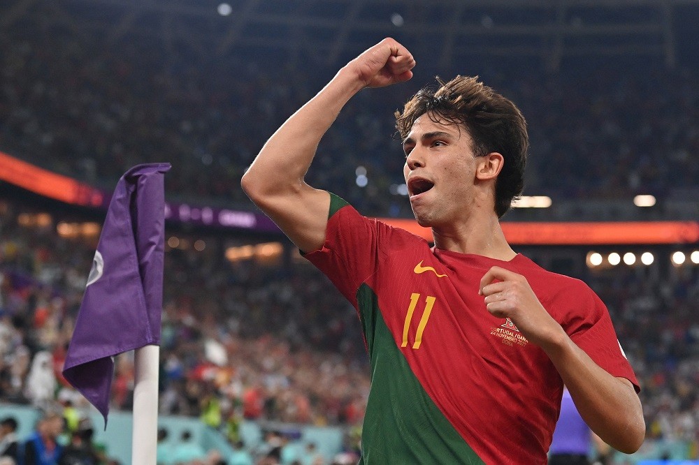 Portugal forward Joao Felix celebrates scoring his team's second goal during the Qatar 2022 World Cup Group H football match between Portugal and Ghana on November 24, 2022. (Photo by GLYN KIRK/AFP via Getty Images)