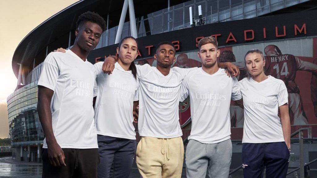 Arsenal players modelling their No More Red kit (Photo via Arsenal.com)