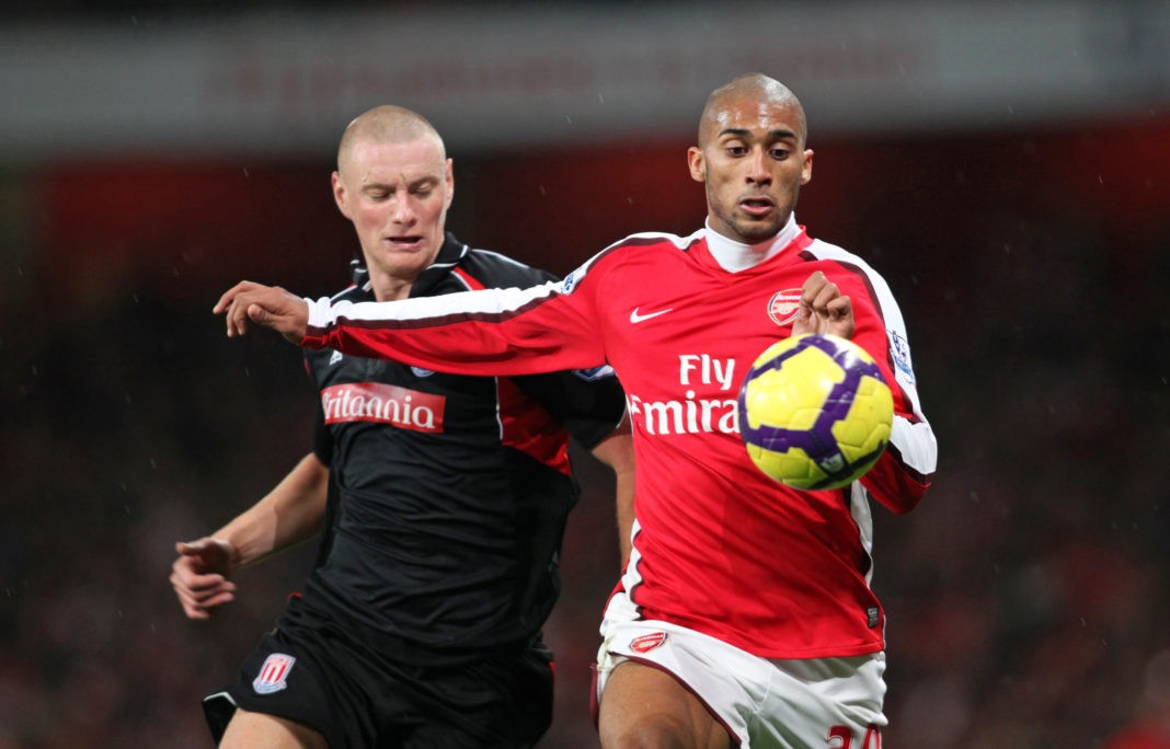 Arsenal's French defence Armand Traore (R) vies with Stoke City's English player Andy Wilkinson (L) during the English Premier League football match between Arsenal and Stoke City at the Emirates stadium, north London on December 5, 2009. (Photo credit CHRIS RATCLIFFE/AFP via Getty Images)