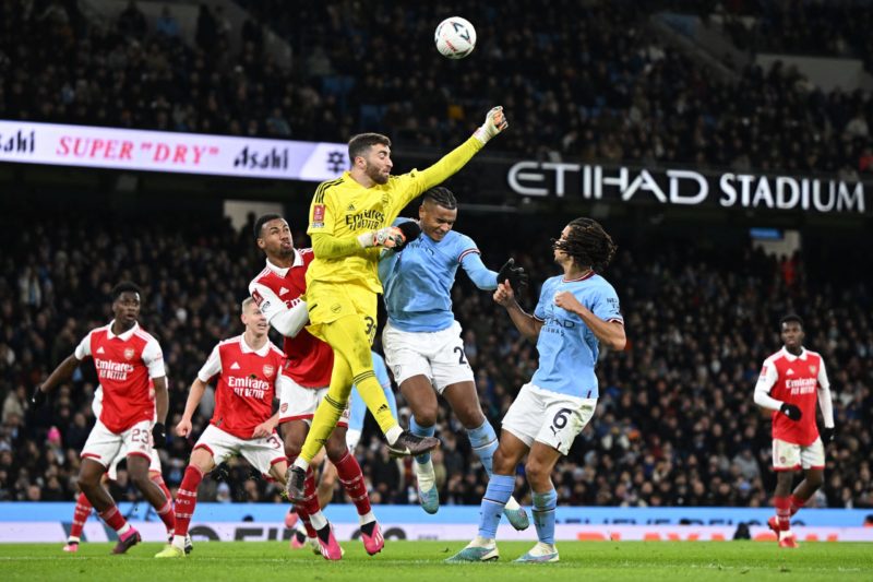 Arsenal's US goalkeeper Matt Turner (C) punches the ball away during the English FA Cup fourth round football match between Manchester City and Arsenal at the Etihad Stadium in Manchester, northwest England, on January 27, 2023. (Photo by OLI SCARFF/AFP via Getty Images)