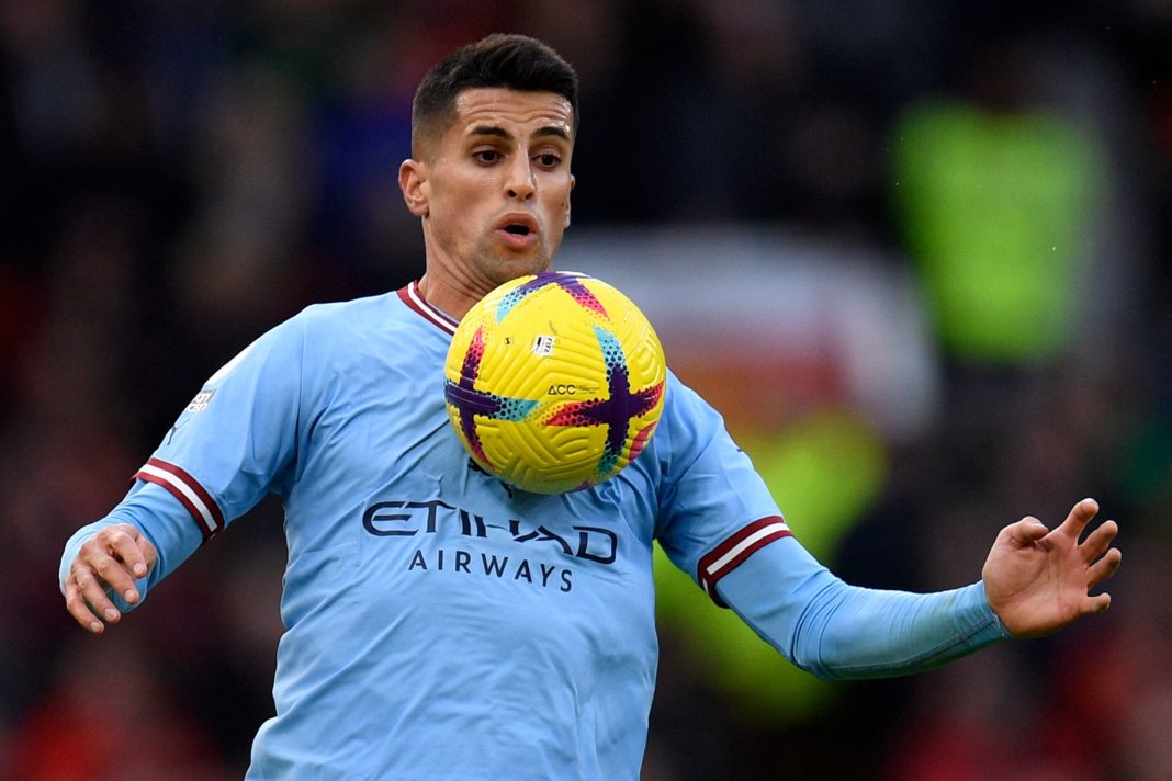 Arsenal transfers - Manchester City's Portuguese defender Joao Cancelo controls the ball during the English Premier League football match between Manchester United and Manchester City at Old Trafford in Manchester, north west England, on January 14, 2023. (Photo by OLI SCARFF/AFP via Getty Images)