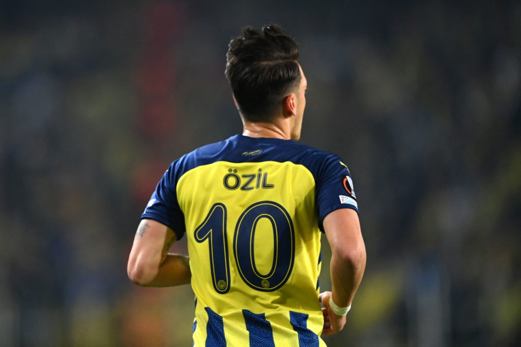 Fenerbahce's German midfielder Mesut Ozil runs on the pitch during the UEFA Europa League group D football match between Fenerbahce and Antwerp at Fenerbahce Sukru Saracoglu Stadium, in Istanbul on October 21, 2021. (Photo by Ozan KOSE / AFP) (Photo by OZAN KOSE/AFP via Getty Images)