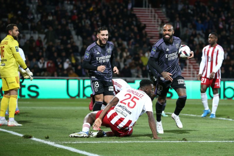 Lyon's French forward Alexandre Lacazette (2ndR) celebrates after scoring a goal during the L1 Football match Ajaccio vs Lyon at the François Coty Stadium in Ajaccio on January 29, 2023. (Photo by PASCAL POCHARD-CASABIANCA/AFP via Getty Images)
