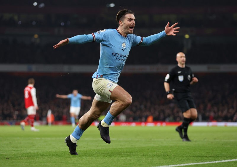 LONDON, ENGLAND - FEBRUARY 15: Jack Grealish of Manchester City celebrates scoring the team's second goal during the Premier League match between Arsenal FC and Manchester City at Emirates Stadium on February 15, 2023 in London, England. (Photo by Julian Finney/Getty Images)