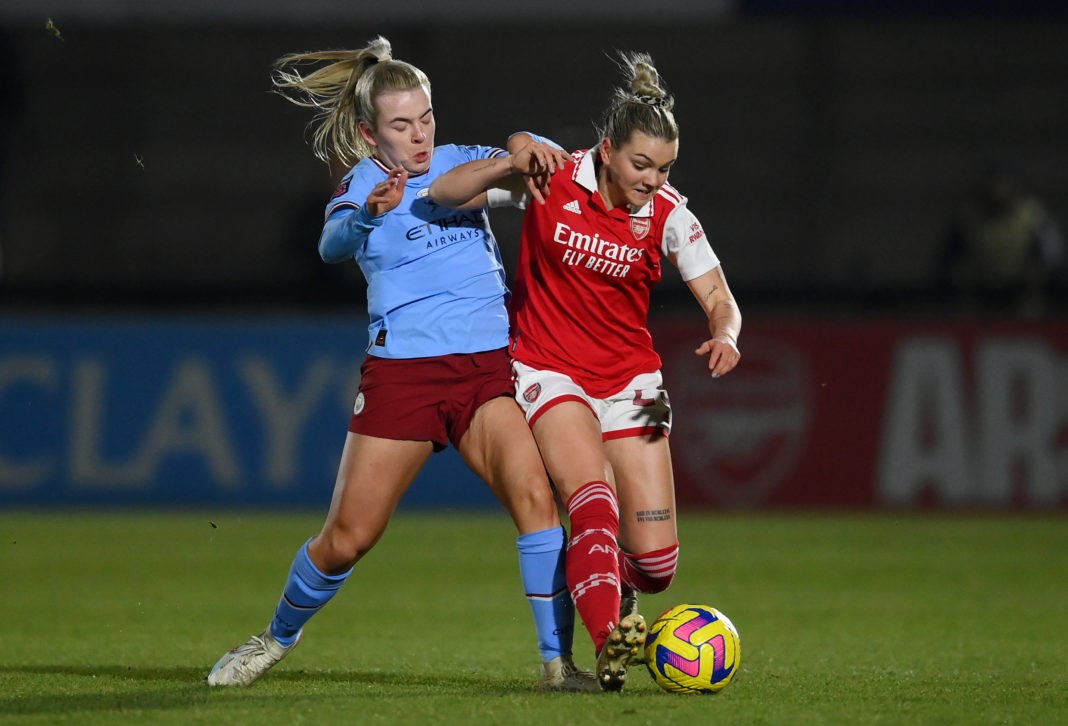 BOREHAMWOOD, ENGLAND - FEBRUARY 08: Laura Wienroither of Arsenal is challenged by Lauren Hemp of Manchester City during the FA Women's Continental Tyres League Cup Semi Final match between Arsenal and Manchester City at Meadow Park on February 08, 2023 in Borehamwood, England. (Photo by Shaun Botterill/Getty Images)