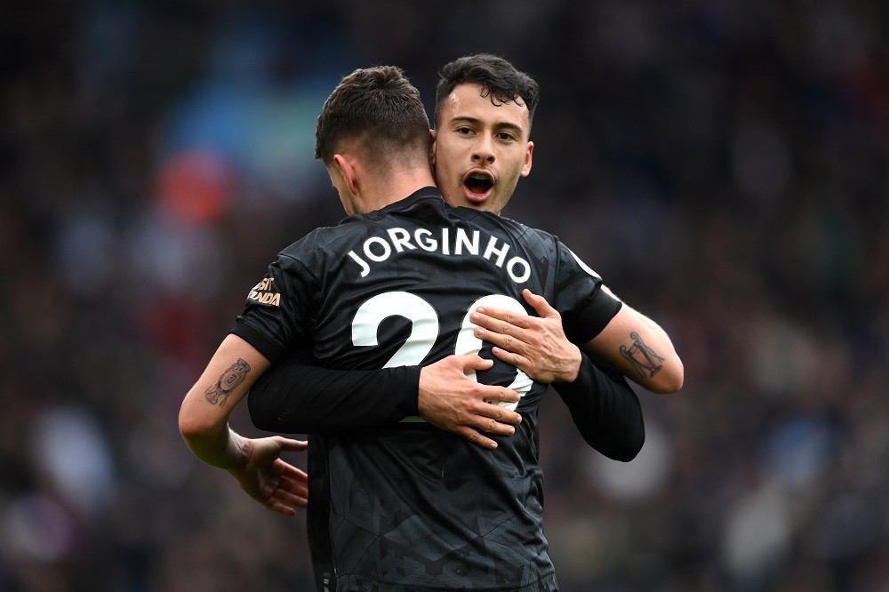 BIRMINGHAM, ENGLAND: Jorginho celebrates with Gabriel Martinelli of Arsenal after scoring the team's third goal during the Premier League match between Aston Villa and Arsenal FC at Villa Park on February 18, 2023. (Photo by Shaun Botterill/Getty Images)