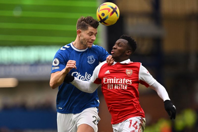 Everton's English defender James Tarkowski (L) heads the ball with Arsenal's English striker Eddie Nketiah during the English Premier League football match between Everton and Arsenal at Goodison Park in Liverpool, north-west England, on February 4, 2023.(Photo by PAUL ELLIS/AFP via Getty Images)