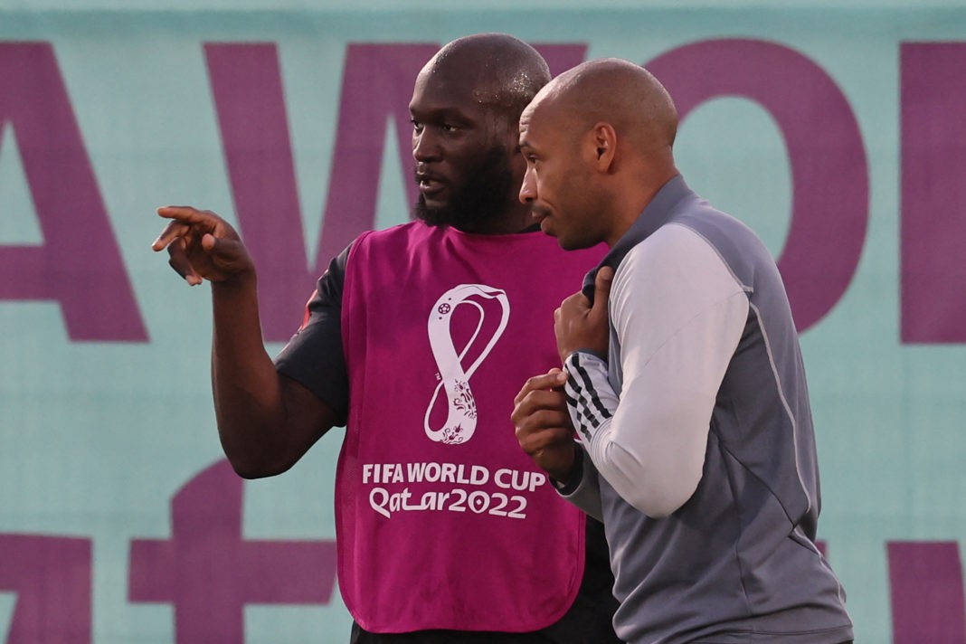 Belgium's forward #09 Romelu Lukaku (L) speaks with Belgium's French assistant coach Thierry Henry (R) during a training session at the Salwa Training Site in Salwa Beach, southwest of Doha on November 30, 2022, on the eve of the Qatar 2022 World Cup football match between Croatia and Belgium. (Photo by JACK GUEZ/AFP via Getty Images)