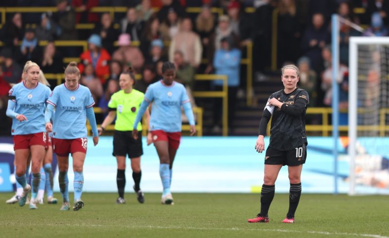 MANCHESTER, ENGLAND - FEBRUARY 11: Kim Little of Arsenal looks dejected after Chloe Kelly (not pictured) of Manchester City scores the team's second goal during the FA Women's Super League match between Manchester City and Arsenal at The Academy Stadium on February 11, 2023 in Manchester, England. (Photo by Nathan Stirk/Getty Images)