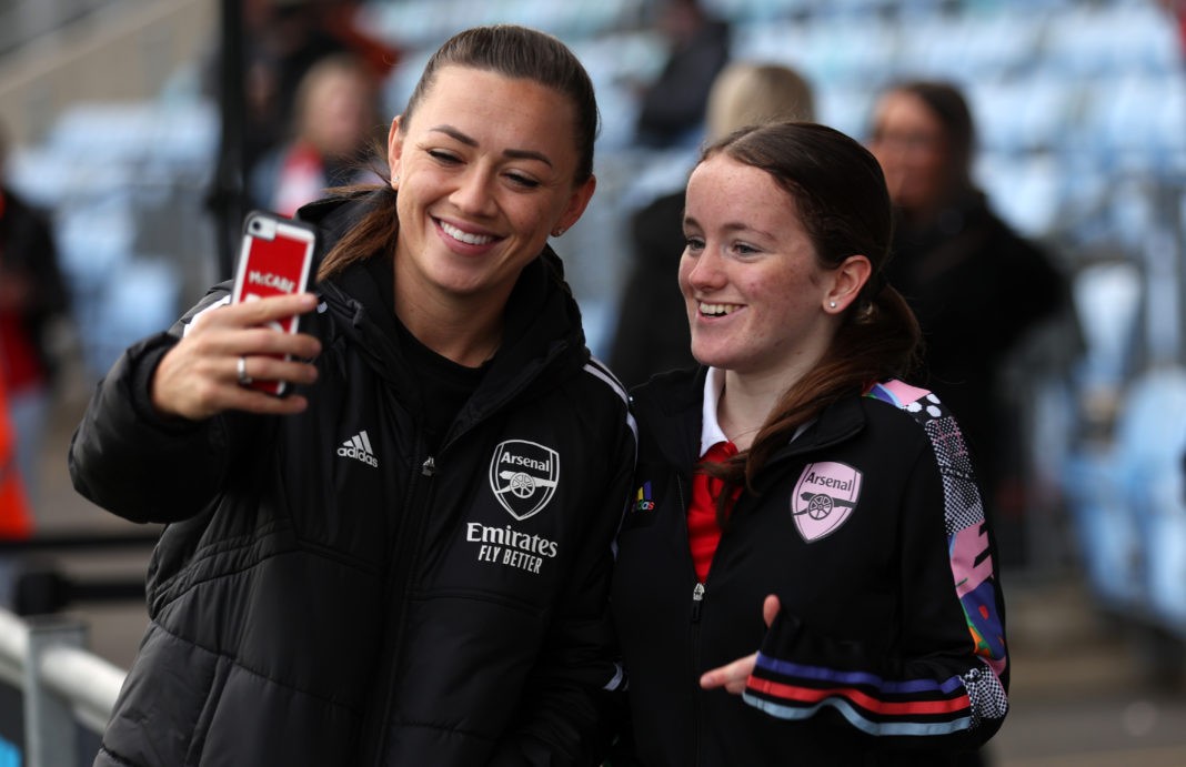 MANCHESTER, ENGLAND - FEBRUARY 11: Katie McCabe of Arsenal takes a selfie with an Arsenal fan prior to the FA Women's Super League match between Manchester City and Arsenal at The Academy Stadium on February 11, 2023 in Manchester, England. (Photo by Nathan Stirk/Getty Images)