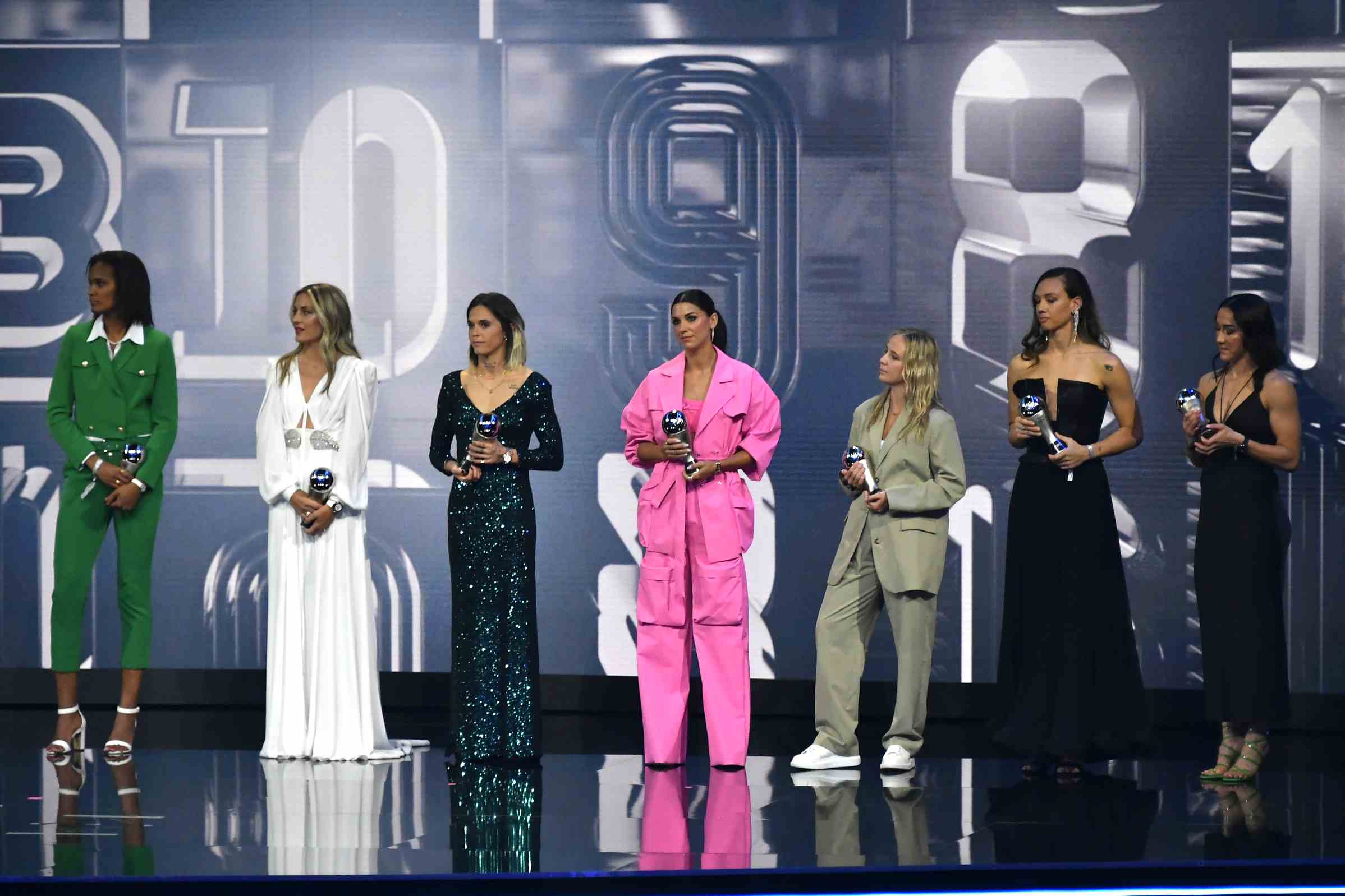 PARIS, FRANCE - FEBRUARY 27: Wendie Renard, Alexia Putellas, Mapi Leon, Alex Morgan, Beth Mead, Christiane Endler and Lucy Bronze are seen with their trophies after being included in the FIFA FIFPRO Women's World 11 2022 during The Best FIFA Football Awards 2022 on February 27, 2023 in Paris, France. (Photo by Aurelien Meunier/Getty Images)