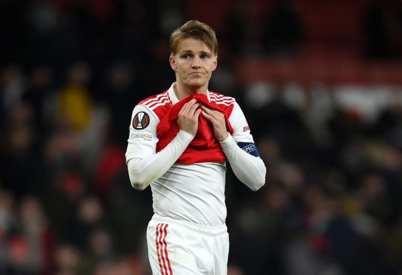Martin Odegaard of Arsenal looks dejected following their side being knocked out of the UEFA Europa League after the UEFA Europa League round of 16 leg two match between Arsenal FC and Sporting CP at Emirates Stadium on March 16, 2023 in London, England. Photo credit: Mike Hewitt/Getty Images.