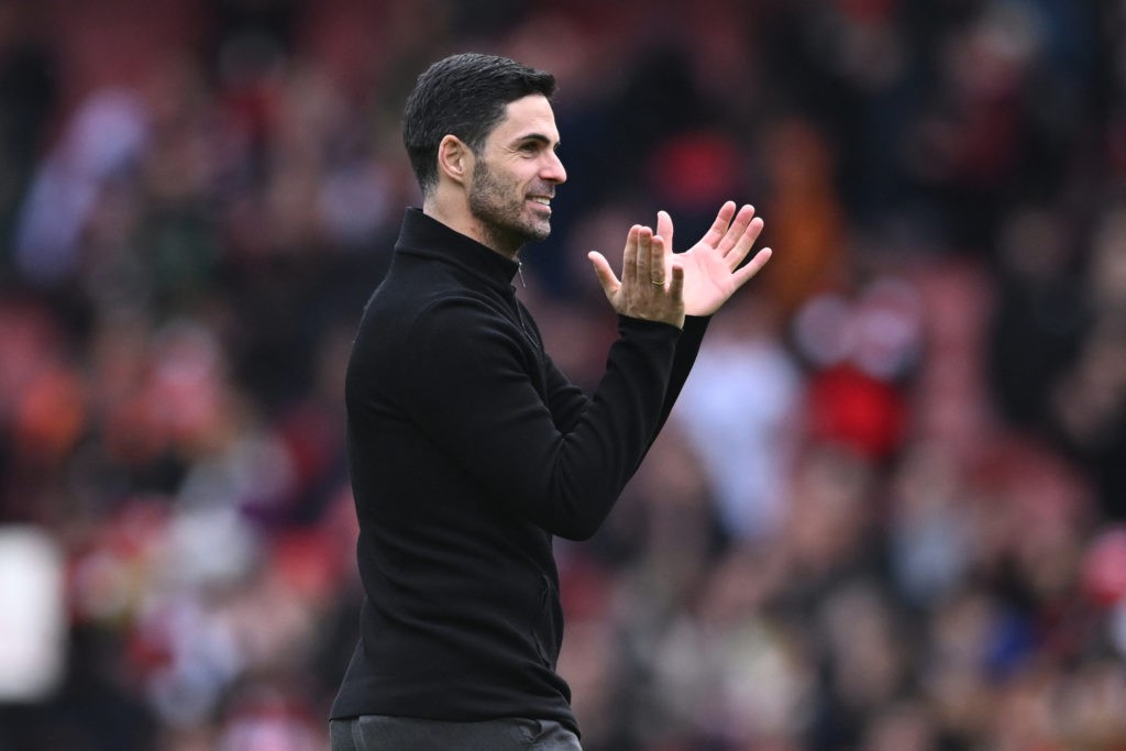 Arsenal's Spanish manager Mikel Arteta applauds fans on the pitch after the English Premier League football match between Arsenal and Crystal Palace at the Emirates Stadium in London on March 19, 2023. - Arsenal won the game 4-1. (Photo by JUSTIN TALLIS/AFP via Getty Images)