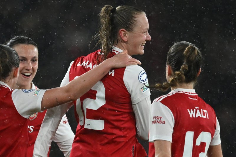Arsenal's Norwegian midfielder Frida Maanum (C) celebrates with teammates after scoring her team first goal during the UEFA Women's Champions League quarter-final second-leg match between Arsenal and Bayern Munich at the Arsenal Stadium, in London, on March 29, 2023. (Photo by JUSTIN TALLIS / AFP) (Photo by JUSTIN TALLIS/AFP via Getty Images)