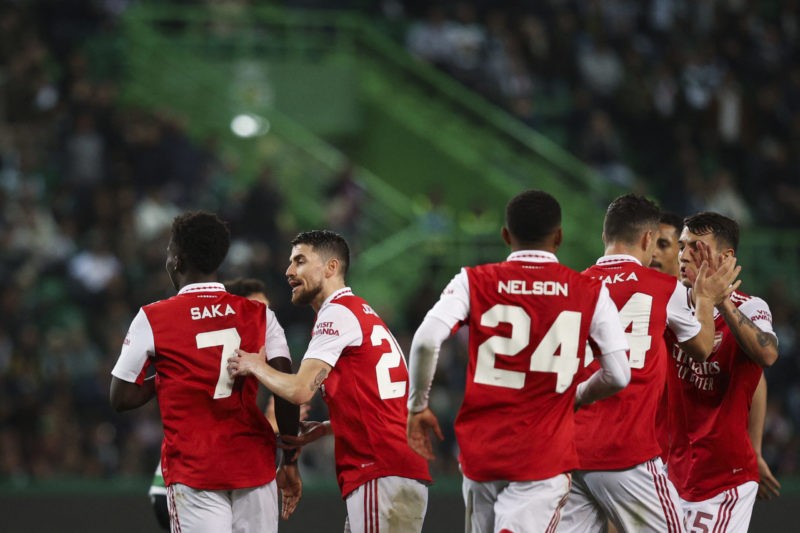 Arsenal's players celebrate after Sporting Lisbon's Japanese midfielder Hidemasa Morita scored an own goal during the UEFA Europa League last 16 first leg football match between Sporting CP and Arsenal at Jose Alvalade stadium in Lisbon on March 9, 2023. (Photo by FILIPE AMORIM/AFP via Getty Images)