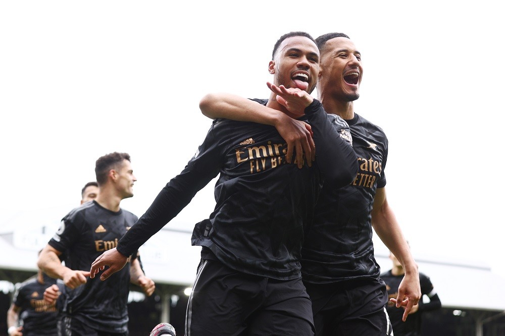 LONDON, ENGLAND: Gabriel celebrates after scoring the team's first goal with teammate William Saliba of Arsenal during the Premier League match between Fulham FC and Arsenal FC at Craven Cottage on March 12, 2023. (Photo by Clive Rose/Getty Images)