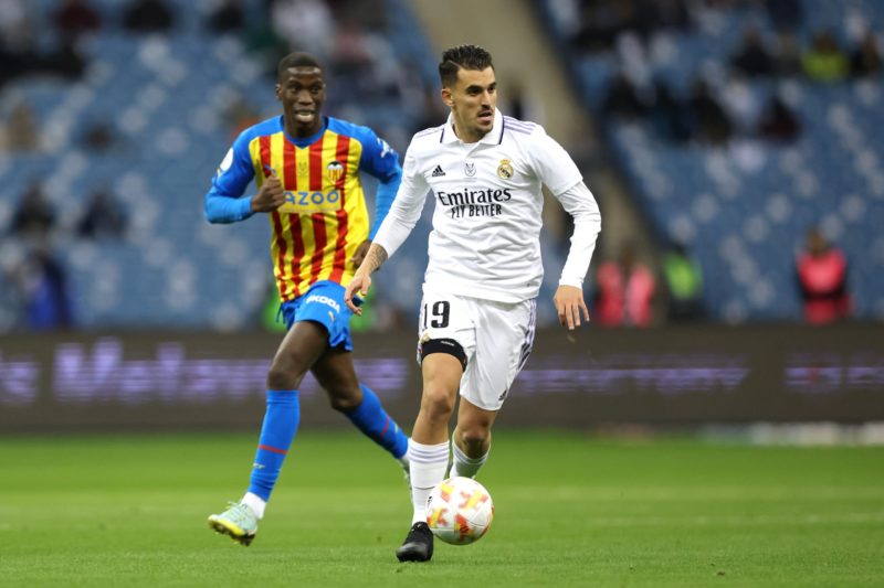 RIYADH, SAUDI ARABIA - JANUARY 11: Dani Ceballos of Real Madrid runs with the ball during the Super Copa de Espana match between Real Madrid and Valencia CF at King Fahd International Stadium on January 11, 2023 in Riyadh, Saudi Arabia. (Photo by Yasser Bakhsh/Getty Images)