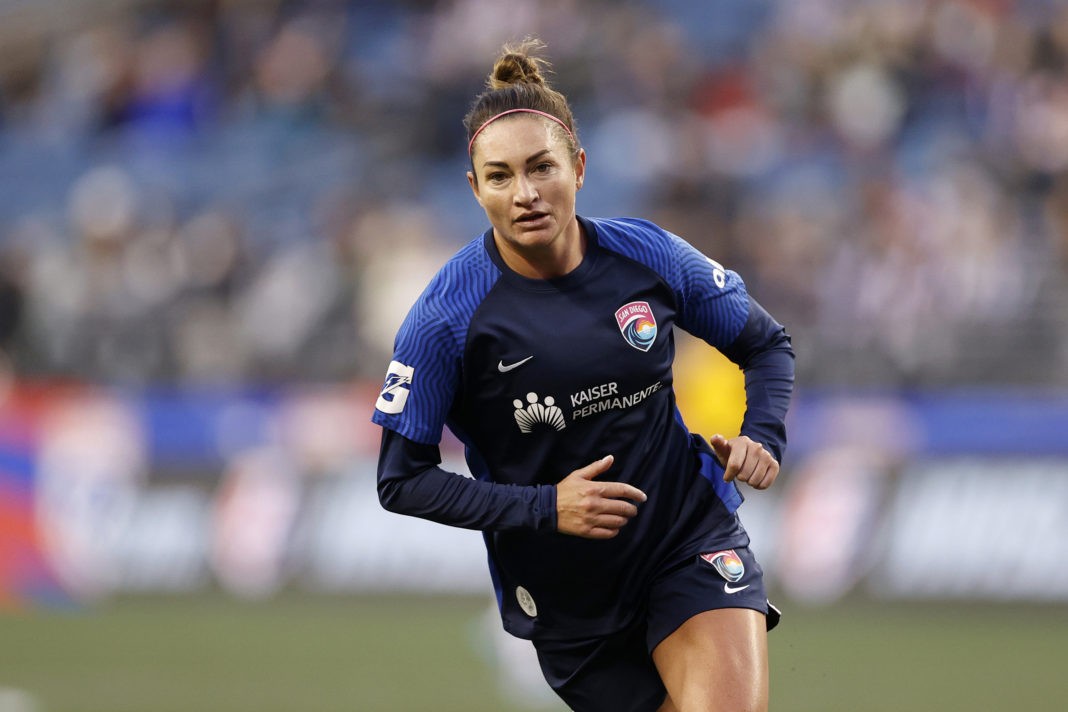 SEATTLE, WASHINGTON - APRIL 14: Jodie Taylor #9 of San Diego Wave FC in action against the OL Reign during the first half at Lumen Field on April 14, 2022 in Seattle, Washington. (Photo by Steph Chambers/Getty Images)
