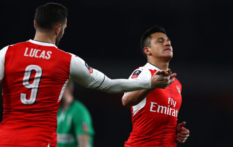 LONDON, ENGLAND - MARCH 11: Alexis Sanchez of Arsenal (R) celebrates scoring his sides fourth goal with Lucas Perez of Arsenal (L) during The Emirates FA Cup Quarter-Final match between Arsenal and Lincoln City at Emirates Stadium on March 11, 2017 in London, England. (Photo by Ian Walton/Getty Images)
