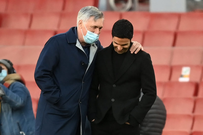 Everton's Italian head coach Carlo Ancelotti (L) and Arsenal's Spanish manager Mikel Arteta (R) chat ahead of the English Premier League football match between Arsenal and Everton at the Emirates Stadium in London on April 23, 2021. (Photo by MICHAEL REGAN/POOL/AFP via Getty Images)