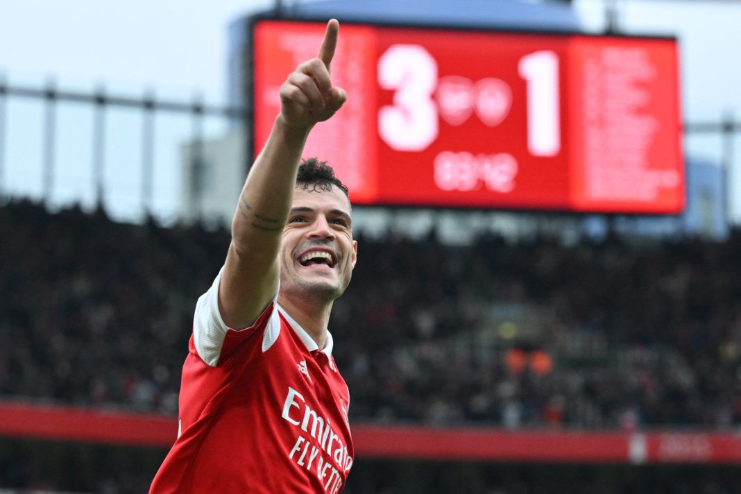 Arsenal's Swiss midfielder Granit Xhaka celebrates after scoring their fourth goal during the English Premier League football match between Arsenal and Leeds United at the Emirates Stadium in London on April 1, 2023. (Photo by GLYN KIRK/AFP via Getty Images)