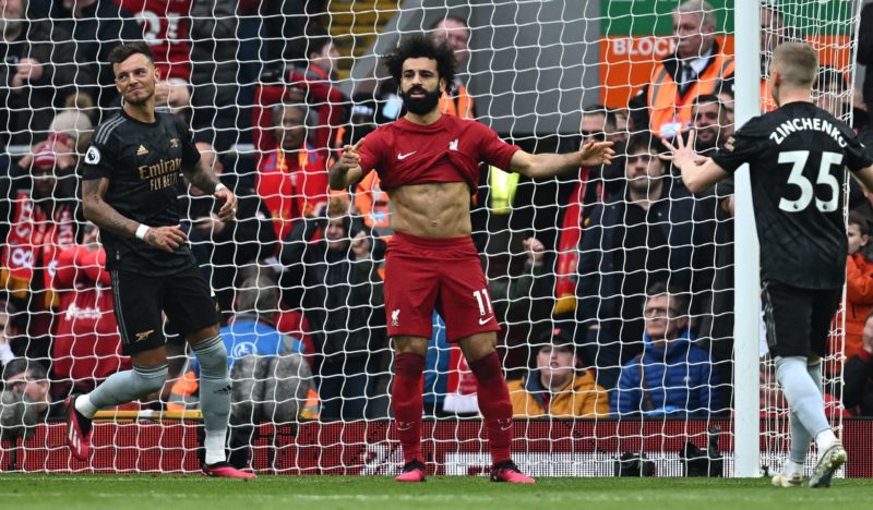 Liverpool's Egyptian striker Mohamed Salah (C) reacts after missing a penalty during the English Premier League football match between Liverpool and Arsenal at Anfield in Liverpool, north west England on April 9, 2023.(Photo by PAUL ELLIS/AFP via Getty Images)