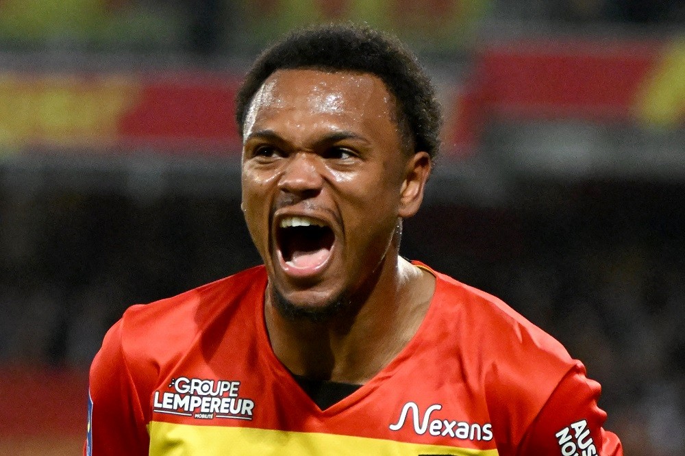 Lens' Belgian forward Lois Openda celebrates scoring his team's second goal during the French L1 football match between RC Lens and AS Monaco at Stade Bollaert-Delelis in Lens, northern France on April 22, 2023. (Photo by FRANCOIS LO PRESTI/AFP via Getty Images)