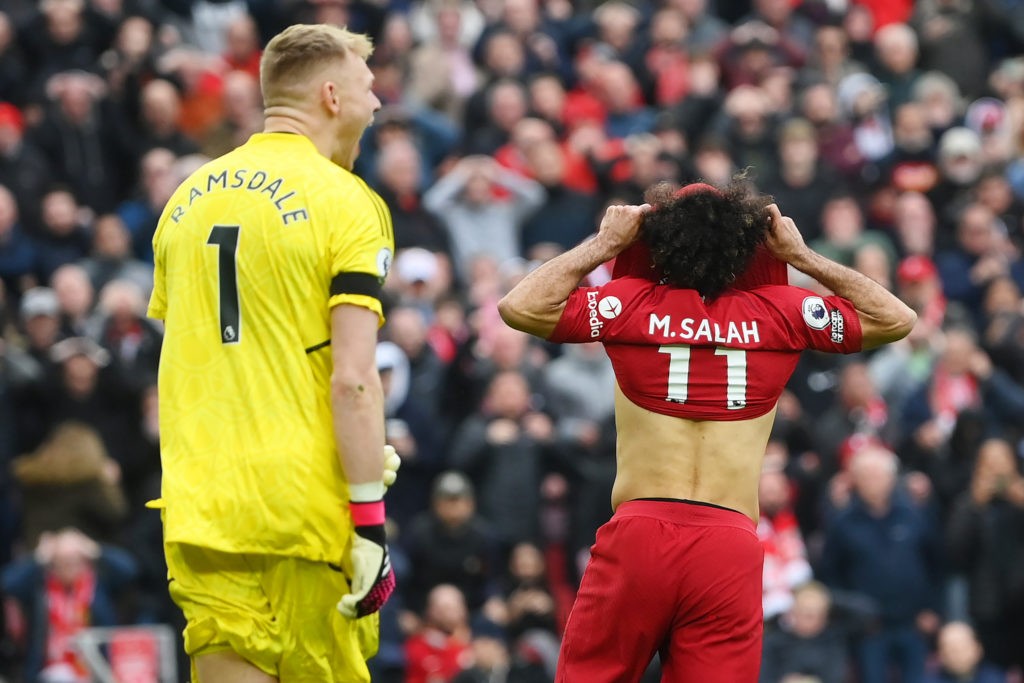 LIVERPOOL, ENGLAND - APRIL 09: Mohamed Salah of Liverpool reacts after missing a penalty kick as Aaron Ramsdale of Arsenal looks on during the Premier League match between Liverpool FC and Arsenal FC at Anfield on April 09, 2023 in Liverpool, England. (Photo by Shaun Botterill/Getty Images)