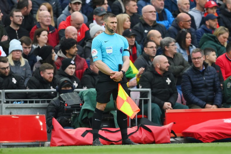 LIVERPOOL, ENGLAND - APRIL 09: Assistant Referee Constantine Hatzidakis looks on during the Premier League match between Liverpool FC and Arsenal FC at Anfield on April 09, 2023 in Liverpool, England. (Photo by Shaun Botterill/Getty Images)