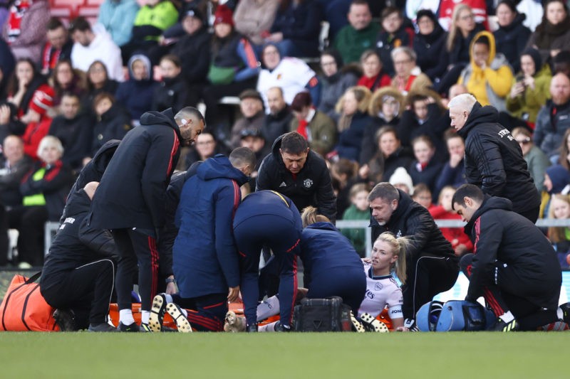 LEIGH, ENGLAND - APRIL 19: Leah Williamson of Arsenal looks on while receiving medical treatment during the FA Women's Super League match between Manchester United and Arsenal at Leigh Sports Village on April 19, 2023 in Leigh, England. (Photo by Naomi Baker/Getty Images )