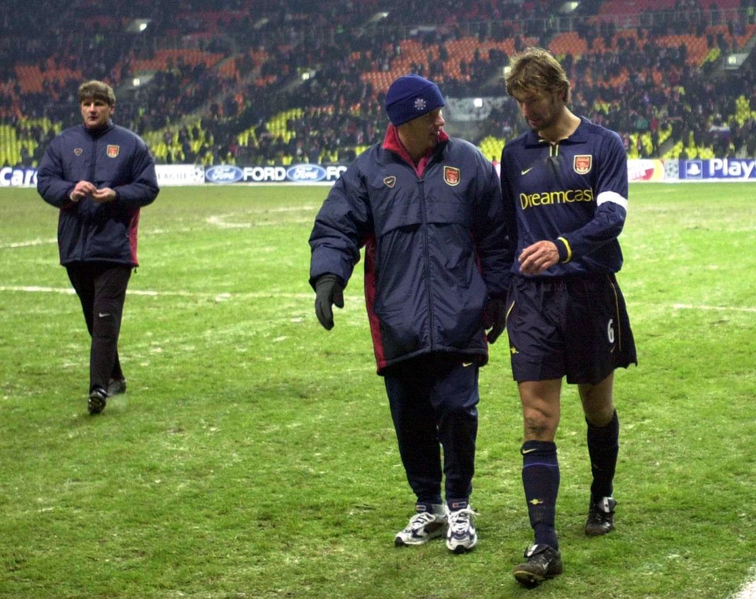 22 Nov 2000: Lee Dixon and Tony Adams of Arsenal leave the field after the Spartak Moscow v Arsenal Champions League match at the Luzhniki Stadium, Moscow, Russia. Digital Image. Image Credit: Ross Kinnaird/ALLSPORT