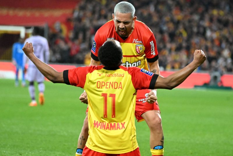 TOPSHOT - Lens' Belgian forward Lois Openda celebrates scoring his team's second goal during the French L1 football match between RC Lens and AS Monaco at Stade Bollaert-Delelis in Lens, northern France on April 22, 2023. (Photo by FRANCOIS LO PRESTI / AFP) (Photo by FRANCOIS LO PRESTI/AFP via Getty Images)