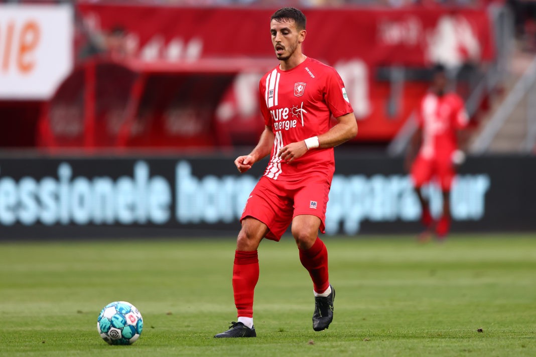ENSCHEDE, NETHERLANDS - JULY 22: Julio Pleguezuelo of Enschede runs with the balls during the Pre-Season friendly match between Twente Enschede and FC Schalke 04 at De Grolsch Veste Stadium on July 22, 2022 in Enschede, Netherlands. (Photo by Christof Koepsel/Getty Images)