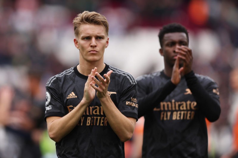LONDON, ENGLAND - APRIL 16: Martin Odegaard of Arsenal acknowledges the fans following the Premier League match between West Ham United and Arsenal FC at London Stadium on April 16, 2023 in London, England. (Photo by Alex Pantling/Getty Images)