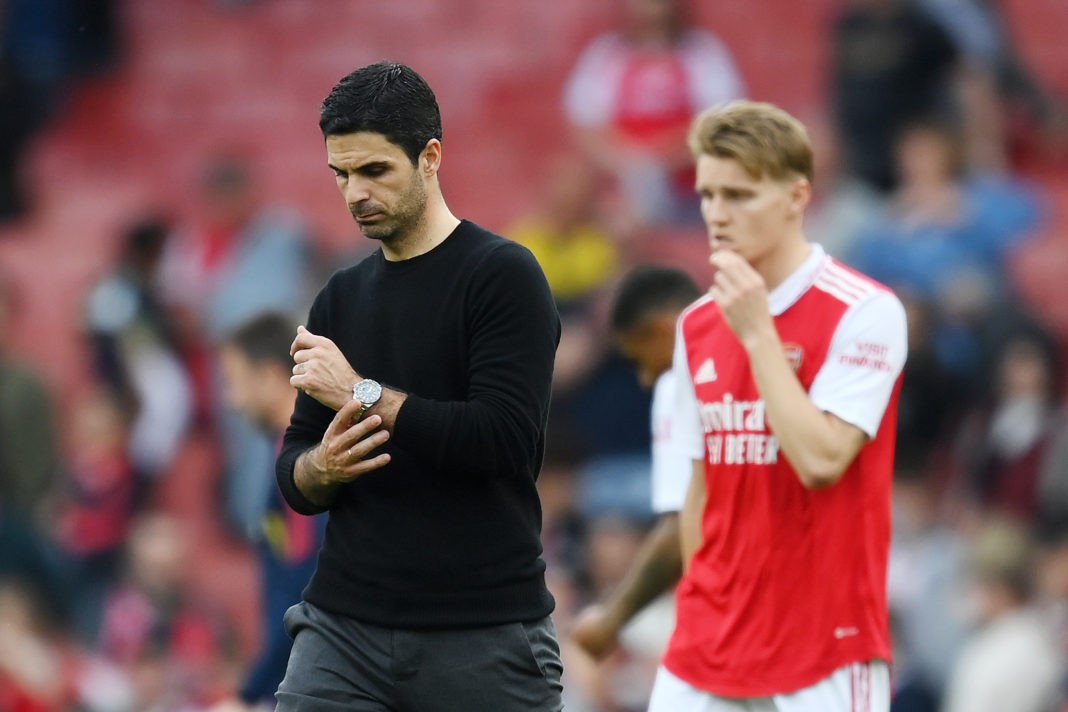 Mikel Arteta ponders Arsenal's defeat vs Brighton and Gabriel Martinell's injury that left him in a protective boot. Martin Odegard is in the background