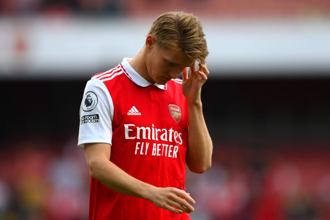 LONDON, ENGLAND - MAY 14: Martin Odegaard of Arsenal looks dejected following the team's defeat during the Premier League match between Arsenal FC and Brighton & Hove Albion at Emirates Stadium on May 14, 2023 in London, England. (Photo by Shaun Botterill/Getty Images)