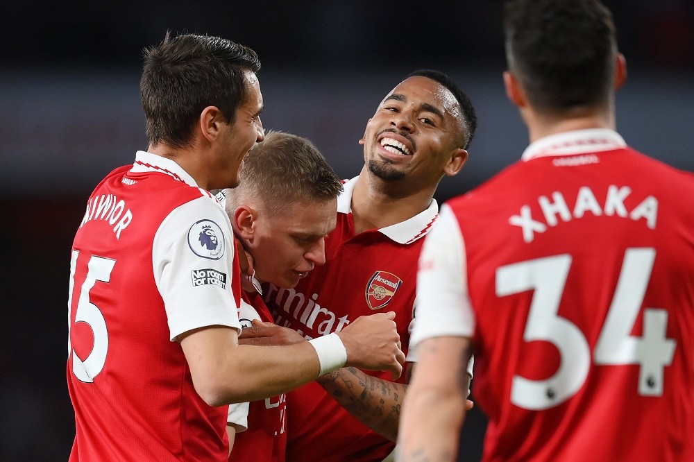 LONDON, ENGLAND: Gabriel Jesus of Arsenal celebrates after scoring the team's third goal with teammates Jakub Kiwior and Oleksandr Zinchenko during the Premier League match between Arsenal FC and Chelsea FC at Emirates Stadium on May 02, 2023. (Photo by Shaun Botterill/Getty Images)